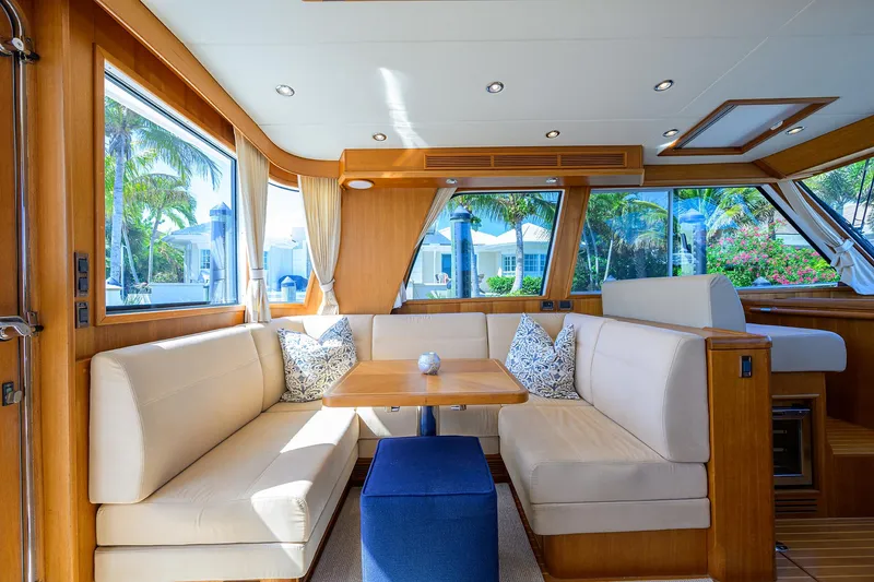 Slide: The Image of Luxurious interior of 2014 Grand Banks 46 Eastbay SX yacht with elegant seating and large windows. - 45