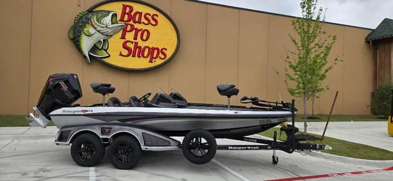 The Image of 2025 Ranger Z518 boat parked outside Bass Pro Shops. - 0