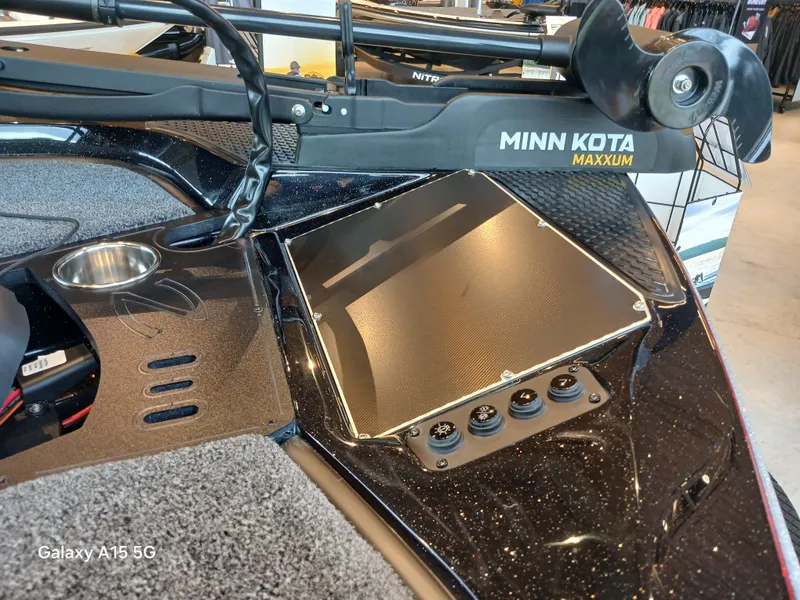Slide: The Image of 2025 Ranger Z518 boat with Minn Kota Maxxum trolling motor, detailed dashboard view. - 17