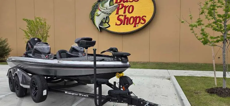 Slide: The Image of 2025 Ranger Z518 boat parked outside Bass Pro Shops. - 5