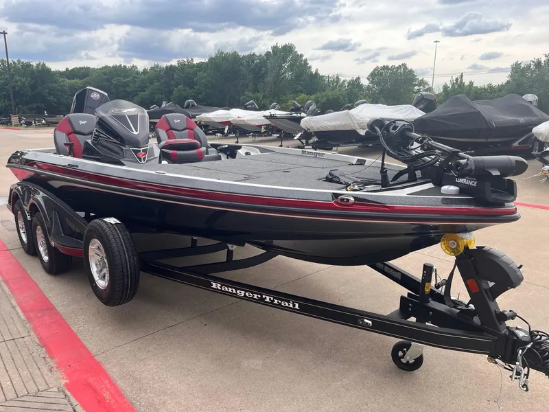 Slide: The Image of 2025 Ranger Z519R boat on trailer, parked outdoors under cloudy sky. - 3