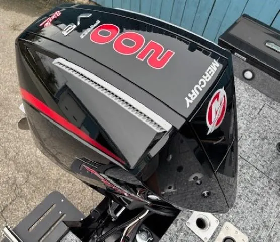 Slide: The Image of 2025 Tracker Targa V-19 Combo with Mercury 200 engine, featuring sleek black and red design. - 28