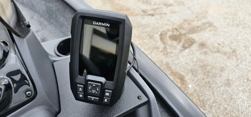 Slide: The Image of Garmin device on 2025 Tracker Super Guide V-16 SC boat dashboard. - 8