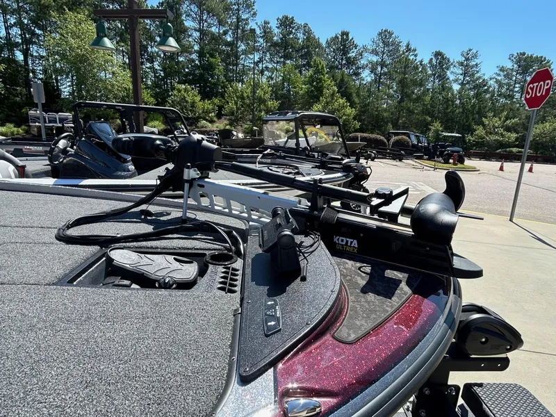 Slide: The Image of 2025 Nitro Z20 XL Pro boat with advanced fishing equipment, parked outdoors. - 4