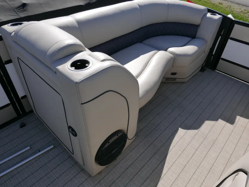 Slide: The Image of 2019 Barletta L23QCSS pontoon boat interior with plush seating and cup holders. - 12