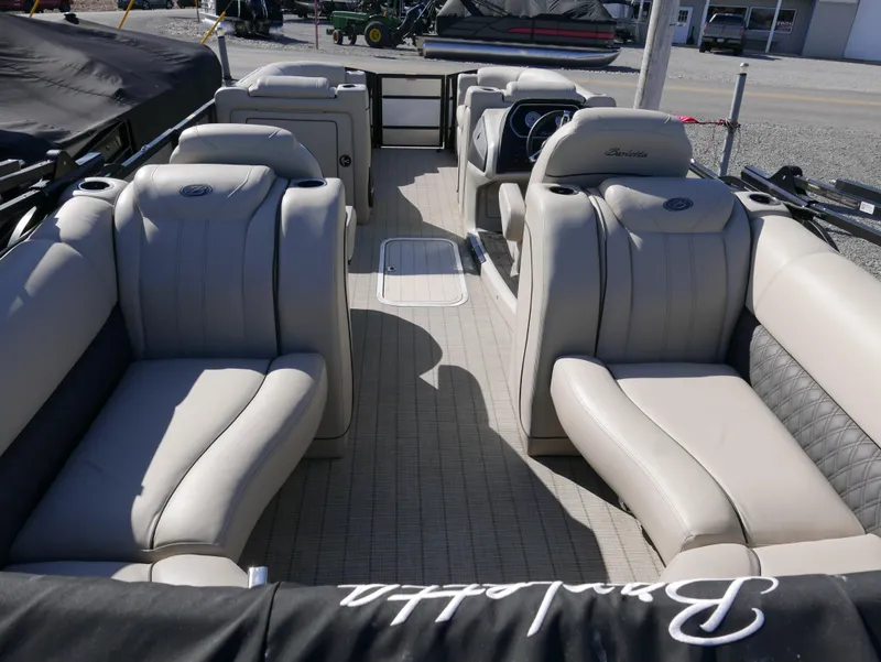 Slide: The Image of 2019 Barletta L23QCSS pontoon boat interior with luxurious seating and modern design. - 18