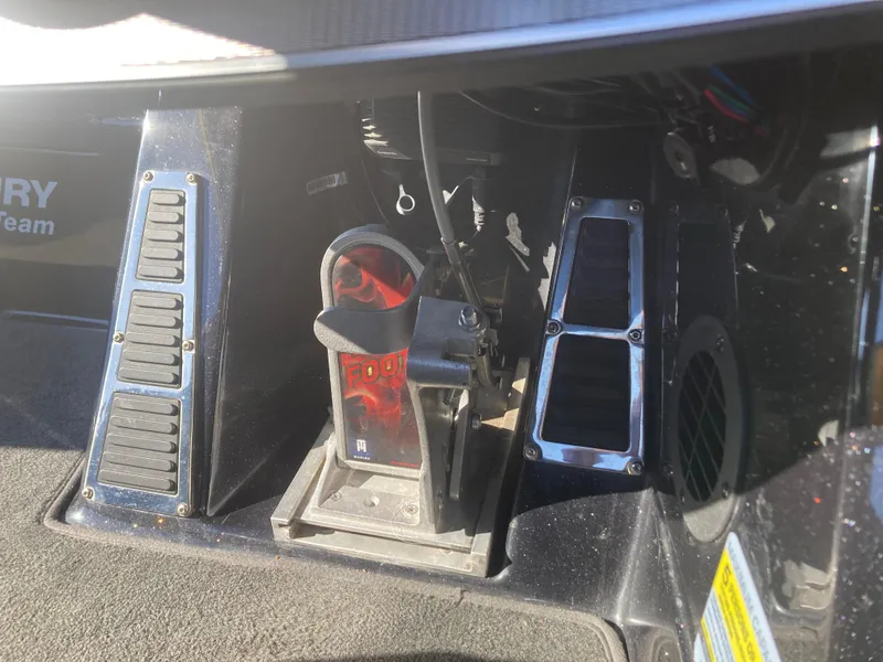 Slide: The Image of Foot pedal controls on a 2015 Ranger Z521 Comanche boat, featuring chrome accents. - 17