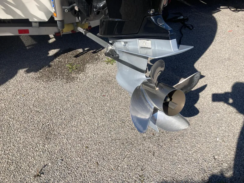 Slide: The Image of 2015 Ranger Z521 Comanche boat propeller on asphalt surface. - 28