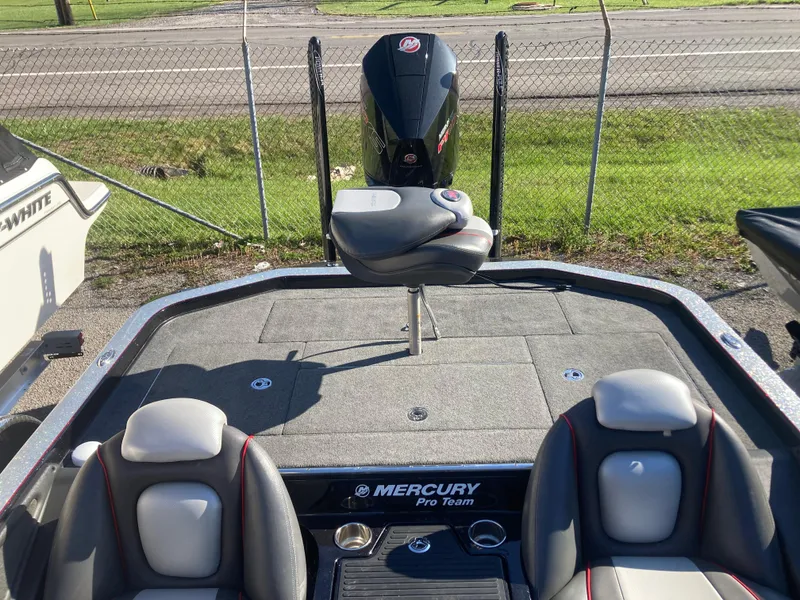 Slide: The Image of 2015 Ranger Z521 Comanche boat with Mercury Pro Team engine, featuring spacious seating and deck. - 9