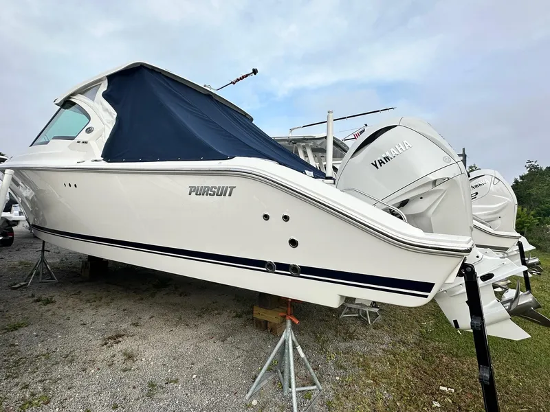 Slide: The Image of 2025 Pursuit DC 326 Dual Console boat with Yamaha engines on display. - 15