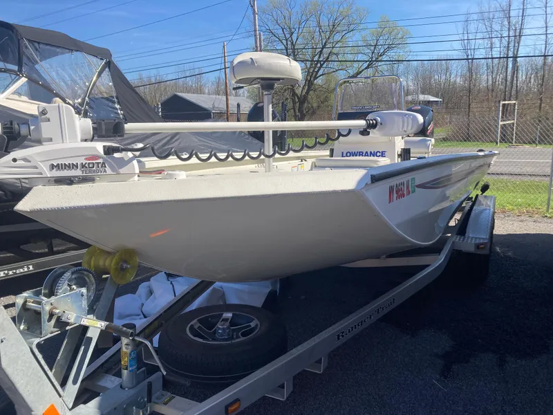 The Image of 2023 Ranger RB200 boat on trailer, equipped with Minn Kota and Lowrance systems. - 0