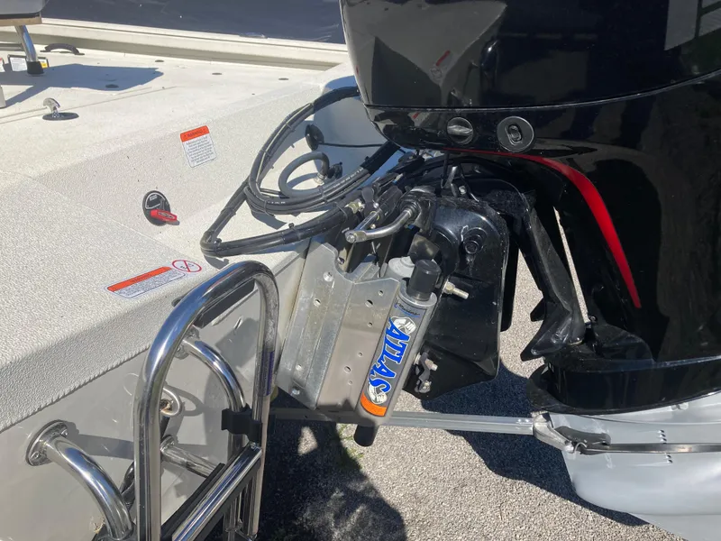 Slide: The Image of 2023 Ranger RB200 boat engine and ladder detail in sunlight. - 10