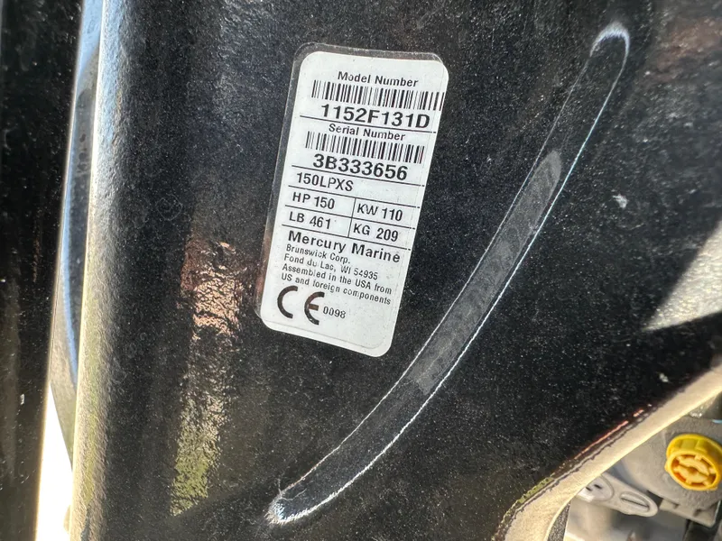 Slide: The Image of Close-up of a 2023 Ranger RB200 engine label with model and serial numbers. - 13