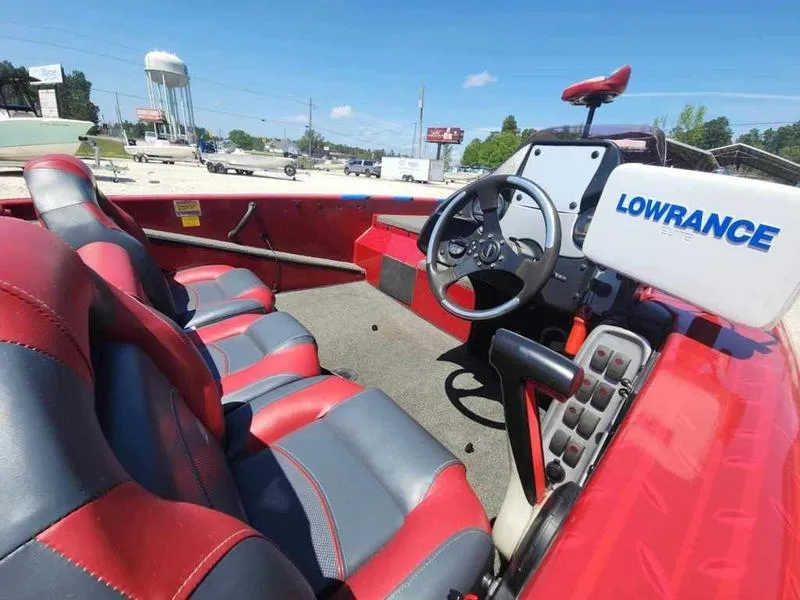 Slide: The Image of 2007 Blazer 190 Pro-V boat interior with red and gray seats, steering wheel, and Lowrance equipment. - 15