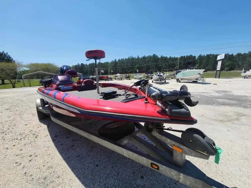 Slide: The Image of Red 2007 Blazer 190 Pro-V boat on trailer in outdoor setting. - 2