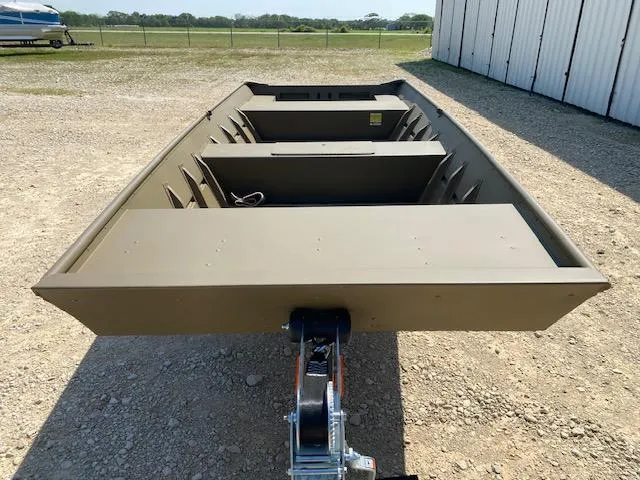 Slide: The Image of 2025 G3 Gator Tough 1648 LW boat on trailer, parked outdoors. - 4