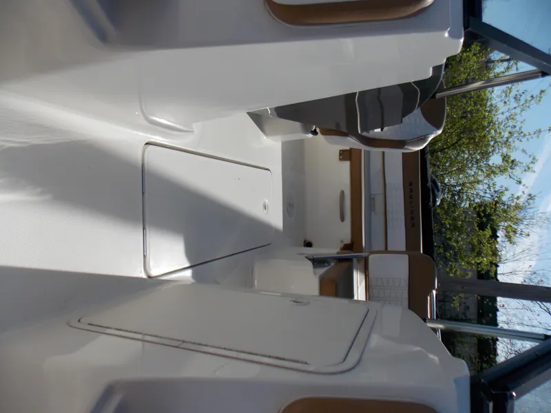 Slide: The Image of 2021 Bayliner VR5 Bowrider OB interior with seating and storage compartments. - 20