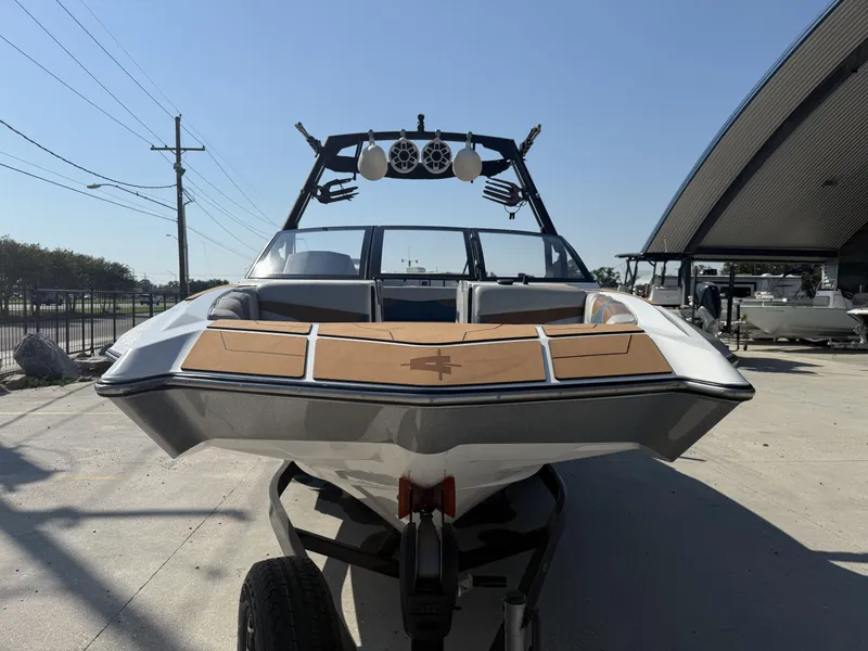 Slide: The Image of 2021 Axis A24 boat on trailer, front view, outdoor display. - 15