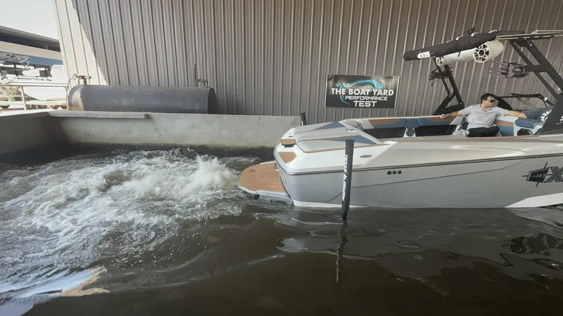 Slide: The Image of 2021 Axis A24 boat undergoing performance test at The Boat Yard facility. - 8