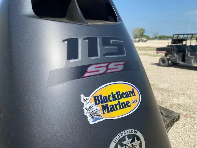 Slide: The Image of Close-up of a 2025 SeaArk Shadow 18 outboard motor with BlackBeard Marine sticker. - 5