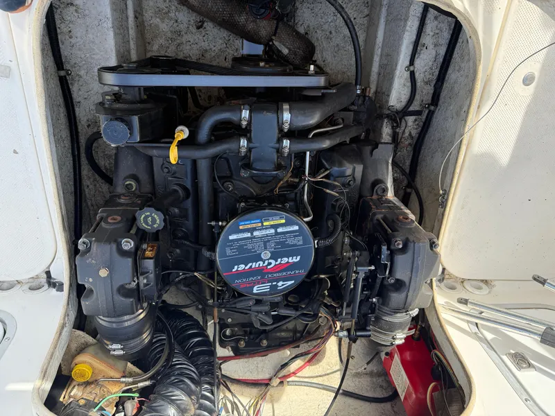 Slide: The Image of Engine compartment of a 1998 Bayliner 2052 Trophy Walkaround boat. - 8