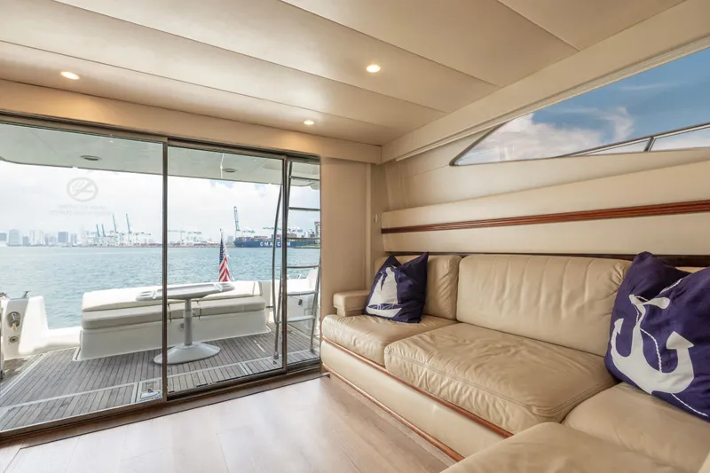 Slide: The Image of Luxurious interior of 1998 Azimut 43 Fly yacht with waterfront view. - 33