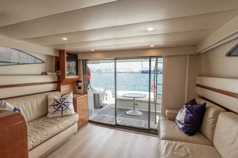 Slide: The Image of Interior of 1998 Azimut 43 Fly yacht with elegant seating and ocean view. - 34