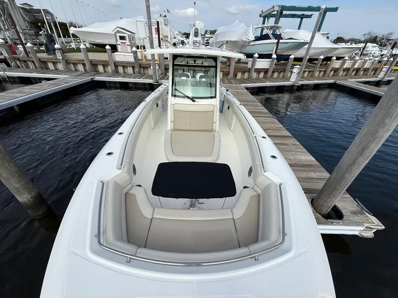 Slide: The Image of 2018 Boston Whaler 330 Outrage boat docked at marina, aerial view. - 15
