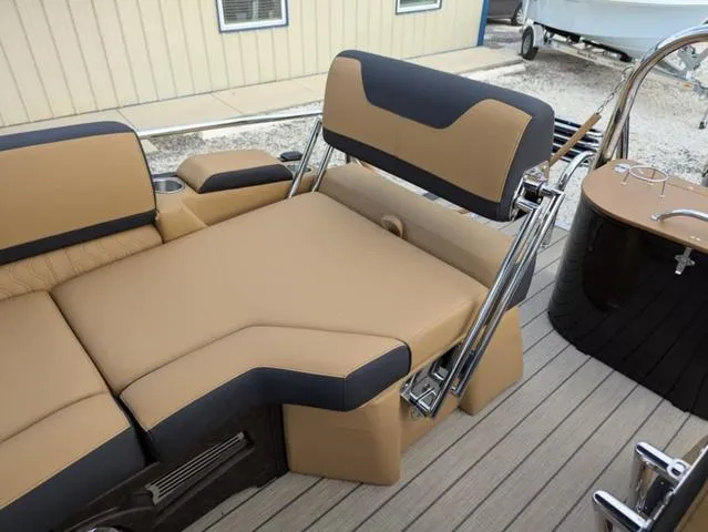Slide: The Image of 2025 Avalon Catalina Quad Lounger 23 FT with luxurious tan and black seating. - 21