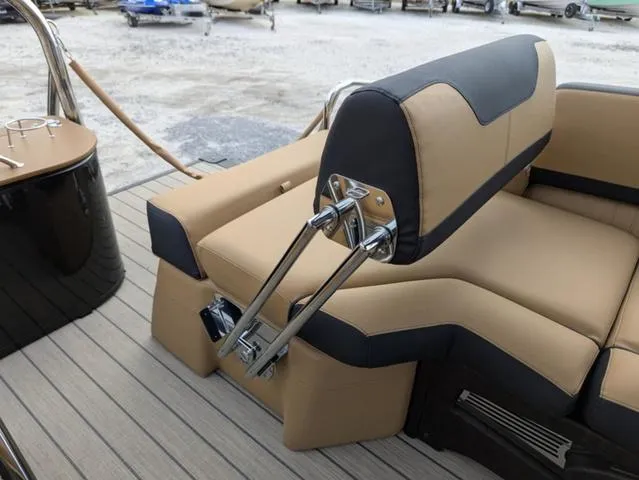 Slide: The Image of 2025 Avalon Catalina Quad Lounger 23 FT with tan and black seating on deck. - 24
