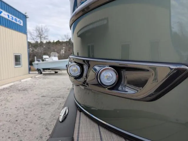 Slide: The Image of 2025 Avalon Catalina Quad Lounger 23 FT boat with sleek design and modern lighting. - 27