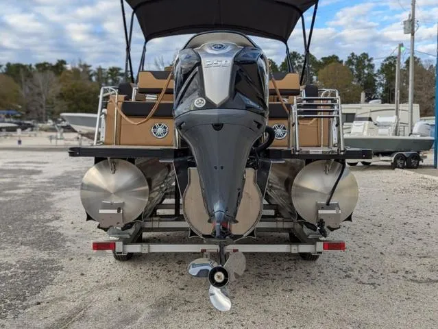 Slide: The Image of 2025 Avalon Catalina Quad Lounger 23 FT pontoon boat with powerful outboard motor. - 5