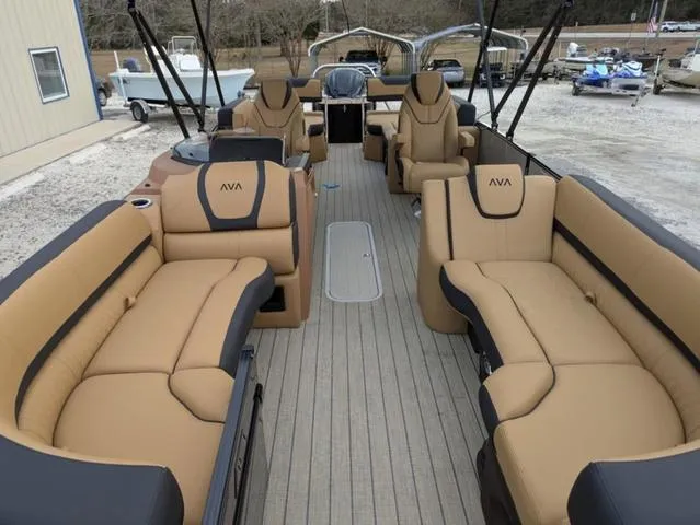 Slide: The Image of 2025 Avalon Catalina Quad Lounger 23 FT with luxurious tan seating and spacious deck layout. - 7
