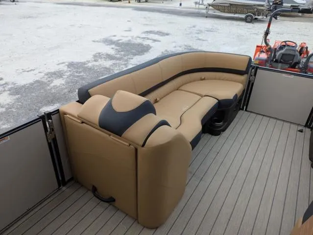 Slide: The Image of 2025 Avalon Catalina Quad Lounger 23 FT with tan seating on a boat deck. - 8