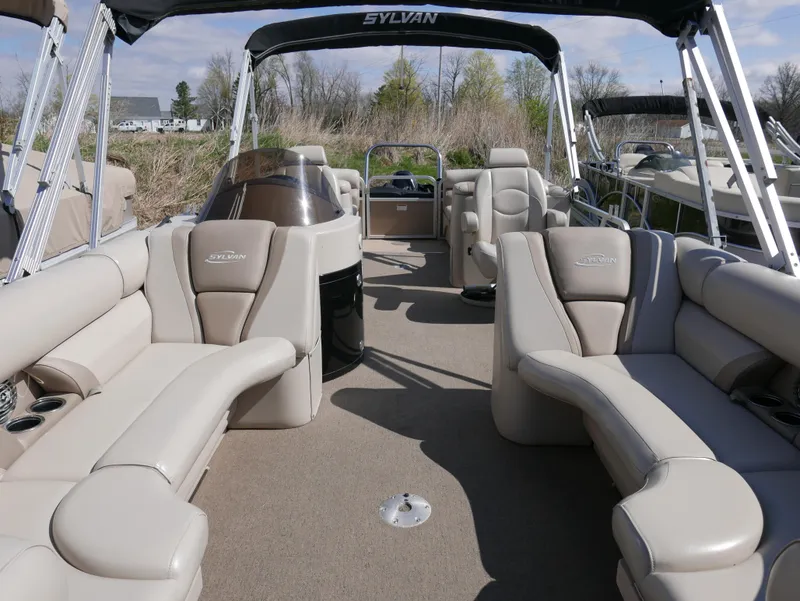 Slide: The Image of 2012 Sylvan Mirage 8522 LZ pontoon boat with spacious seating and elegant interior design. - 6