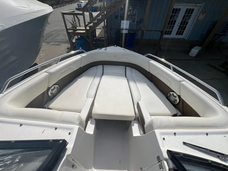 Slide: The Image of 2014 Chaparral 257 SSX boat with spacious bow seating and sleek design. - 1