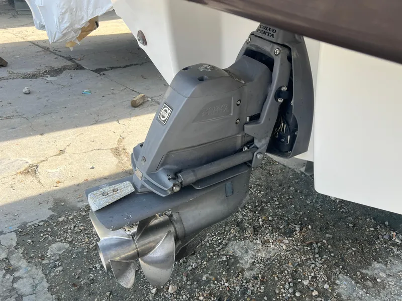 Slide: The Image of 2014 Chaparral 257 SSX boat stern drive and propeller on concrete surface. - 10