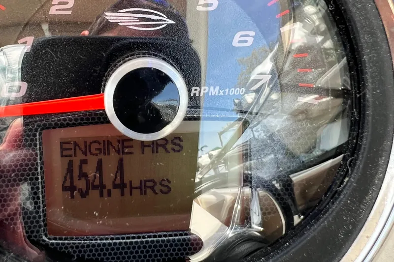 Slide: The Image of Close-up of Chaparral 257 SSX 2014 tachometer showing 454.4 engine hours. - 9