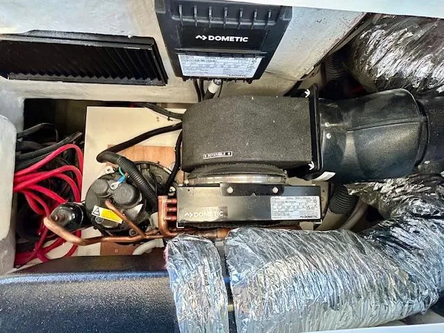 Slide: The Image of Engine compartment of a 2024 Beneteau Antares 9 with Dometic equipment and wiring. - 19