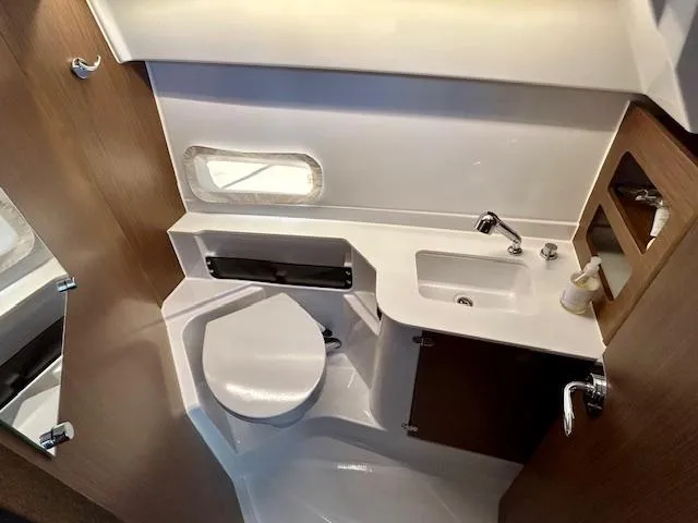 Slide: The Image of 2024 Beneteau Antares 9 bathroom with modern fixtures and compact design. - 27