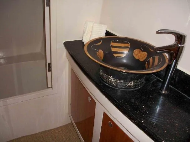 Slide: The Image of Elegant bathroom sink with artistic bowl design on Prout 45S, 2009 model yacht. - 19