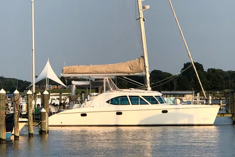 Slide: The Image of Sailing catamaran Prout 45S, 2009 model, docked at a marina. - 2