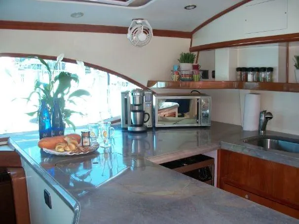 Slide: The Image of Modern kitchen interior on 2009 Prout 45S yacht with appliances and decor. - 29