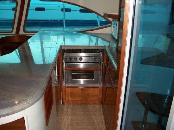 Slide: The Image of Interior of 2009 Prout 45S yacht kitchen with modern appliances and sleek design. - 30
