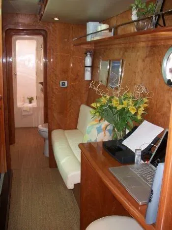 Slide: The Image of Luxurious interior of 2009 Prout 45S yacht with wood paneling and modern amenities. - 34