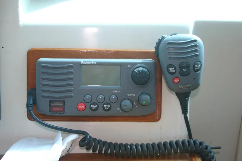 Slide: The Image of Boat radio system on a 2009 Prout 45S, featuring a microphone and control panel. - 45