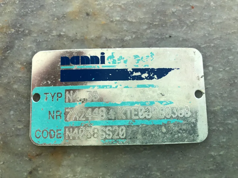 Slide: The Image of Metal plate with Nanni logo and serial numbers, Prout 45S 2009. - 49