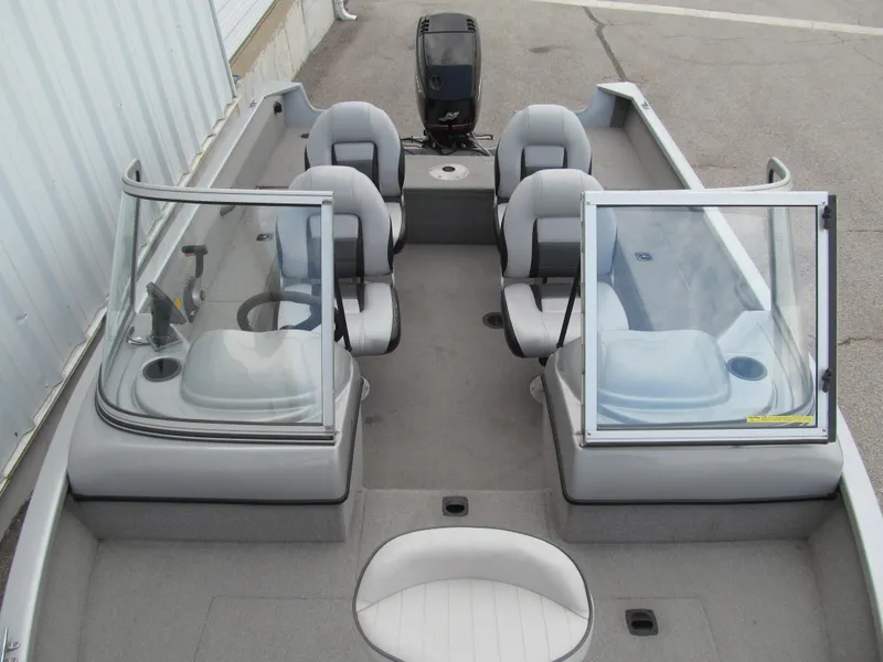 Slide: The Image of 2007 Tracker Pro Guide V-17 WT boat interior with seating and windshield. - 10