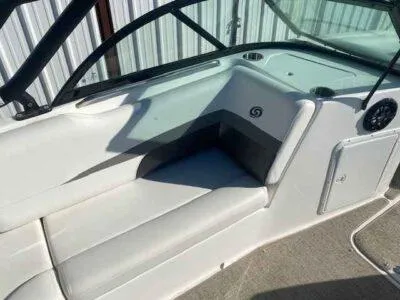 Slide: The Image of 2023 Hurricane SunDeck 187 OB boat interior with white seating and black accents. - 10