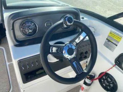 Slide: The Image of Steering wheel and dashboard of 2023 Hurricane SunDeck 187 OB boat. - 7